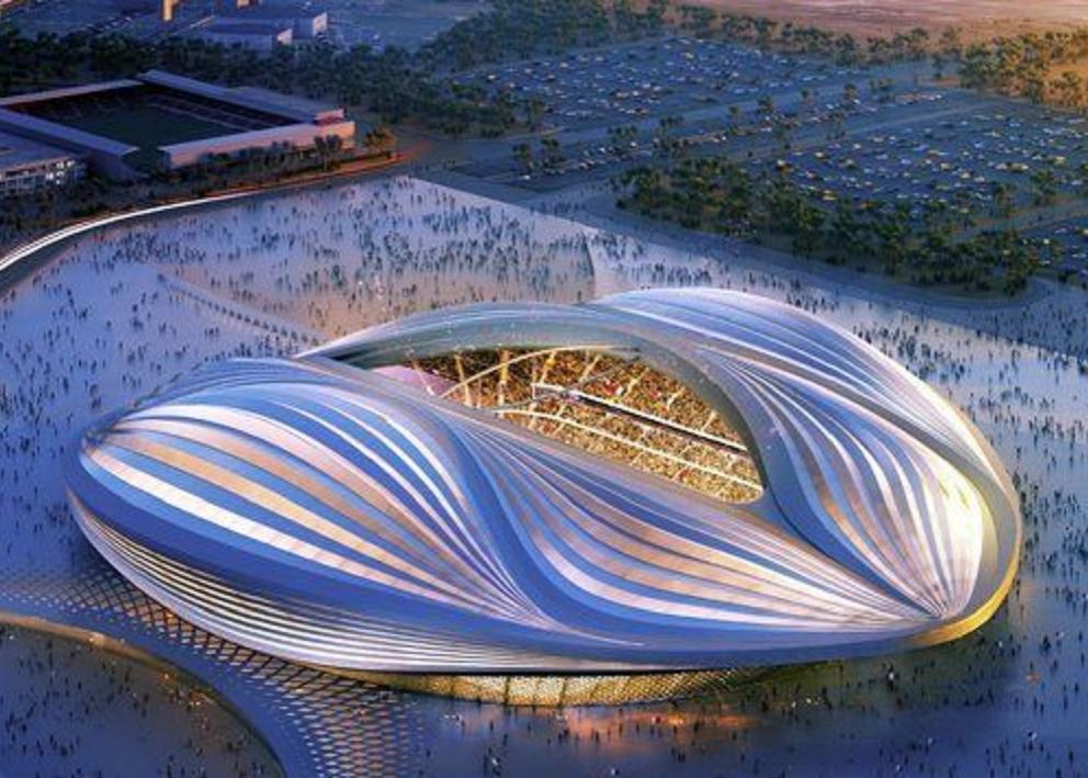 Al Bayt Stadium at dusk in Al Khor, Qatar.